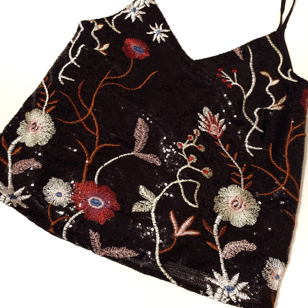 Embroidered floral sequin top.